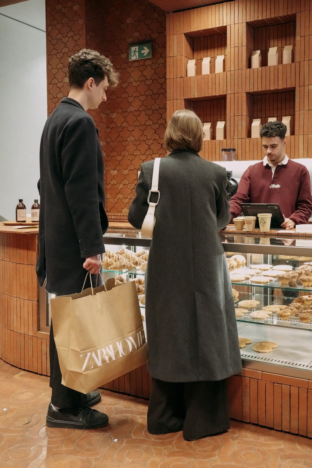 store detective watching shopper