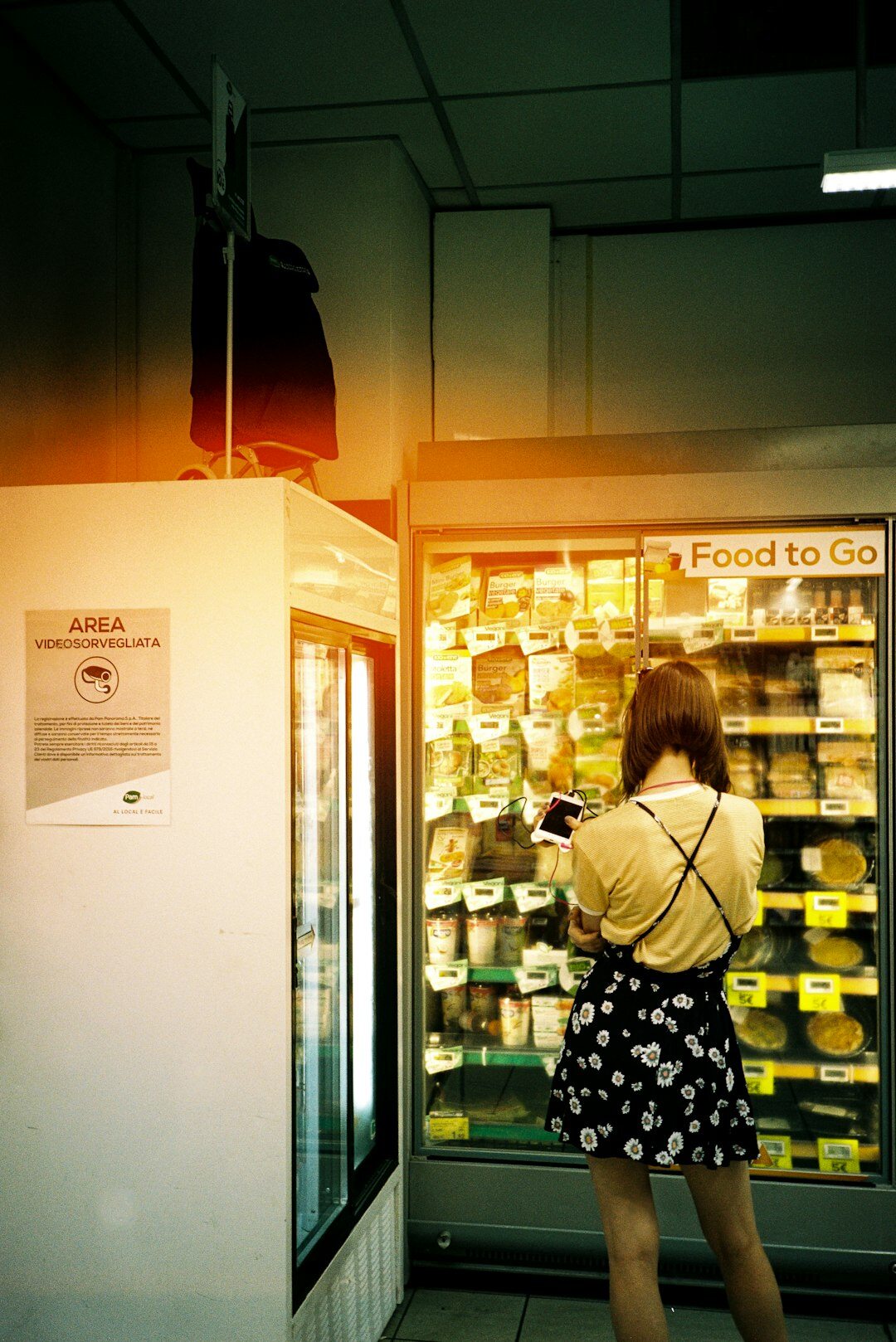 store detective watching customer